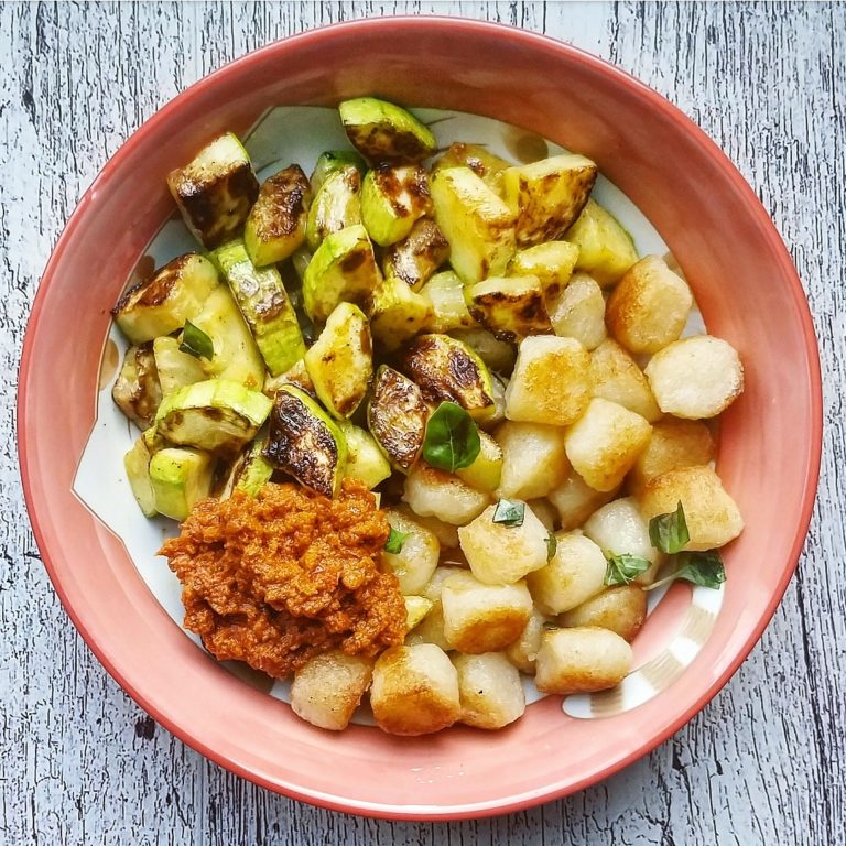 Sauteed Zucchini + Cauliflower Gnocchi topped with Sundried Tomato Pesto