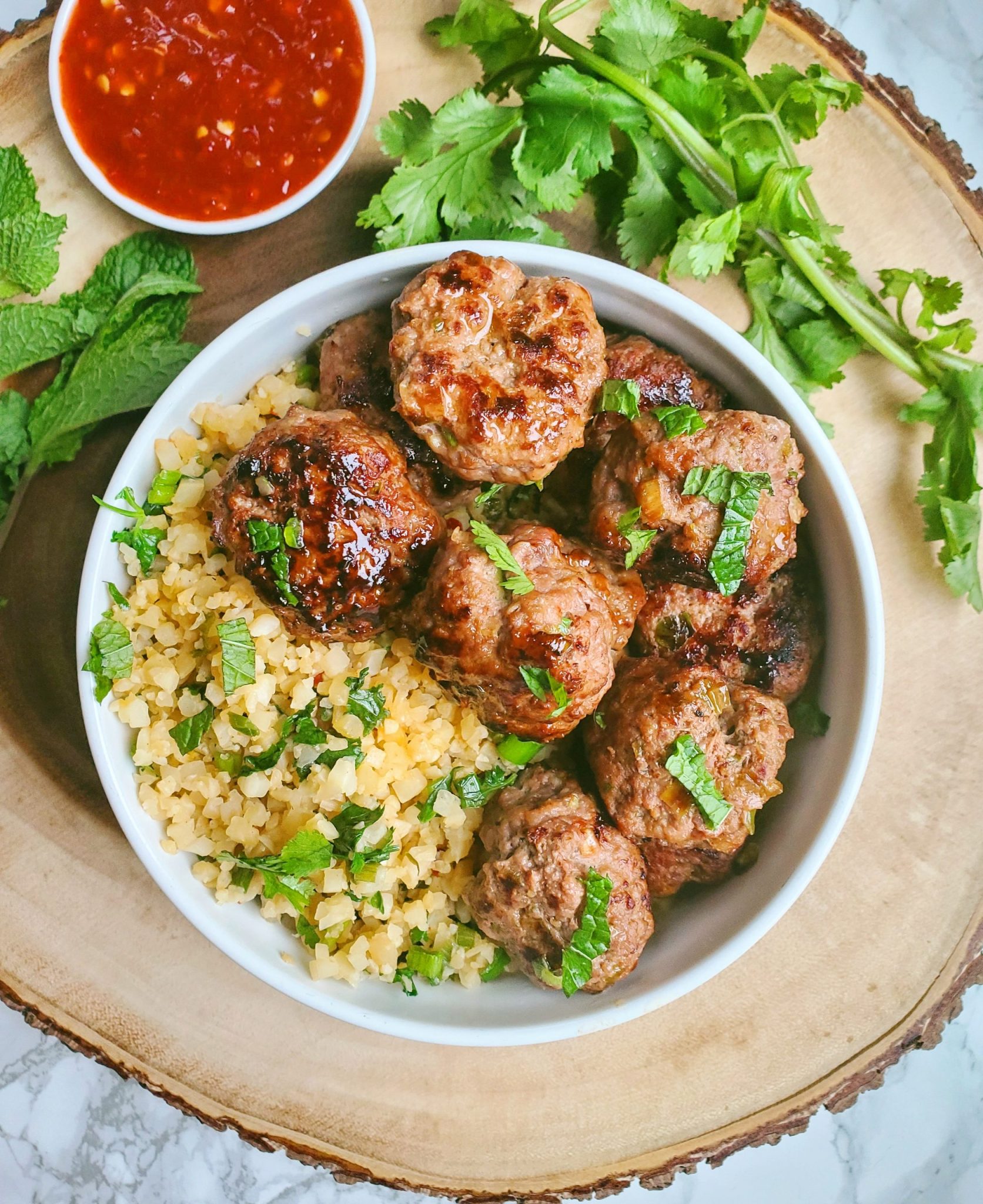Vietnamese Meatballs with Cilantro Mint Cauliflower Rice Spinach and