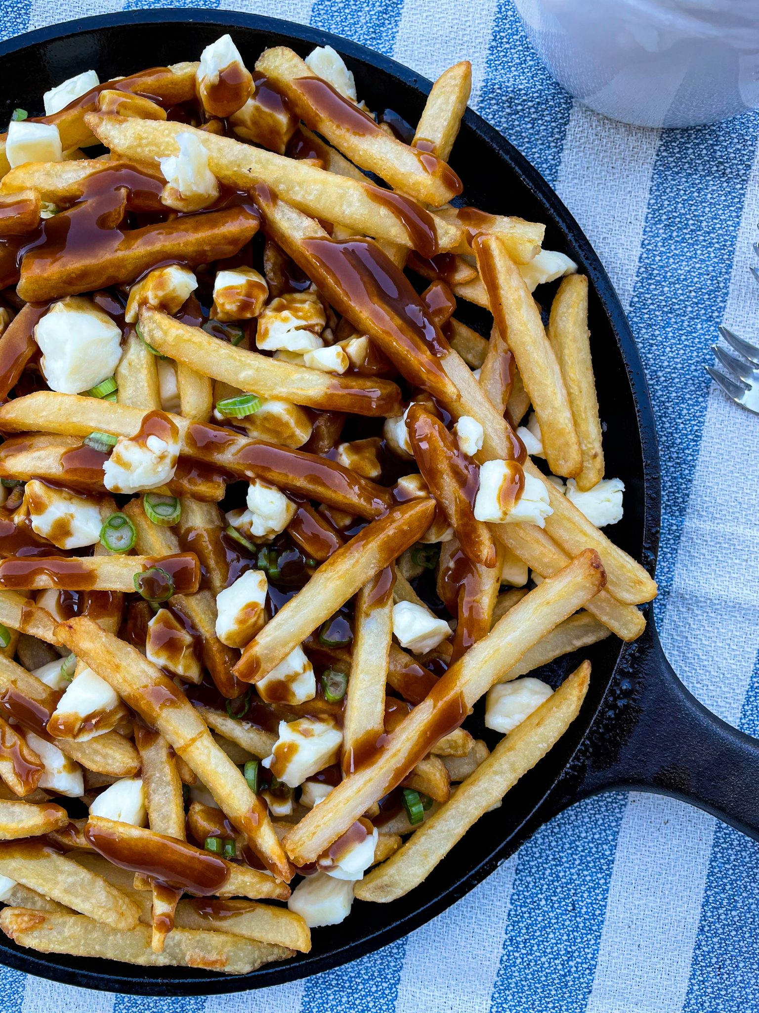 Easy Poutine | A Canadian Dish of French Fries, Cheese Curds, and Gravy