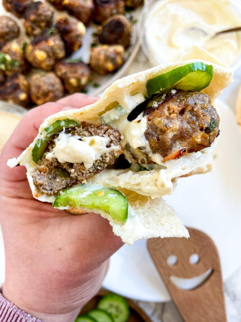 Feta Meatballs on Pita bread with hummus and cucumbers