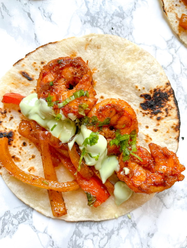 Avocado Lime Crema on Shrimp Fajitas