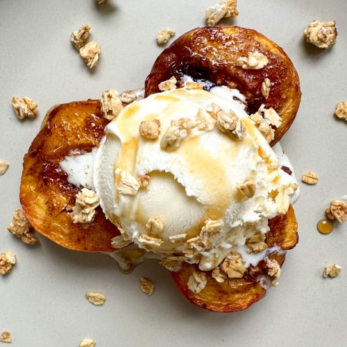 Air Fryer Peaches with Cinnamon Sugar Butter, Vanilla Ice Cream. Granola. and Maple Syrup