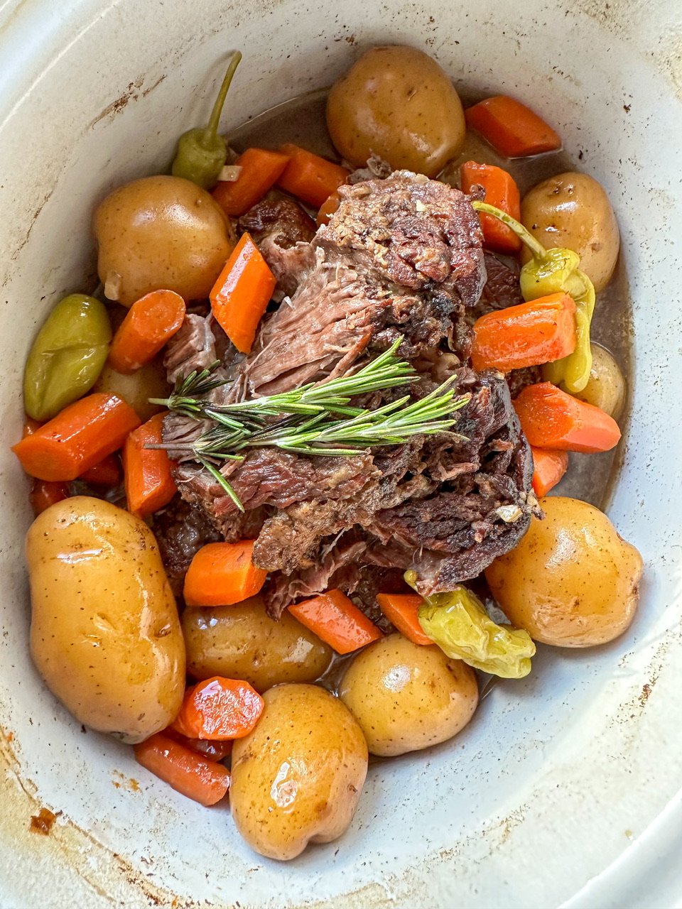 Braised chuck roast made in a slow cooker