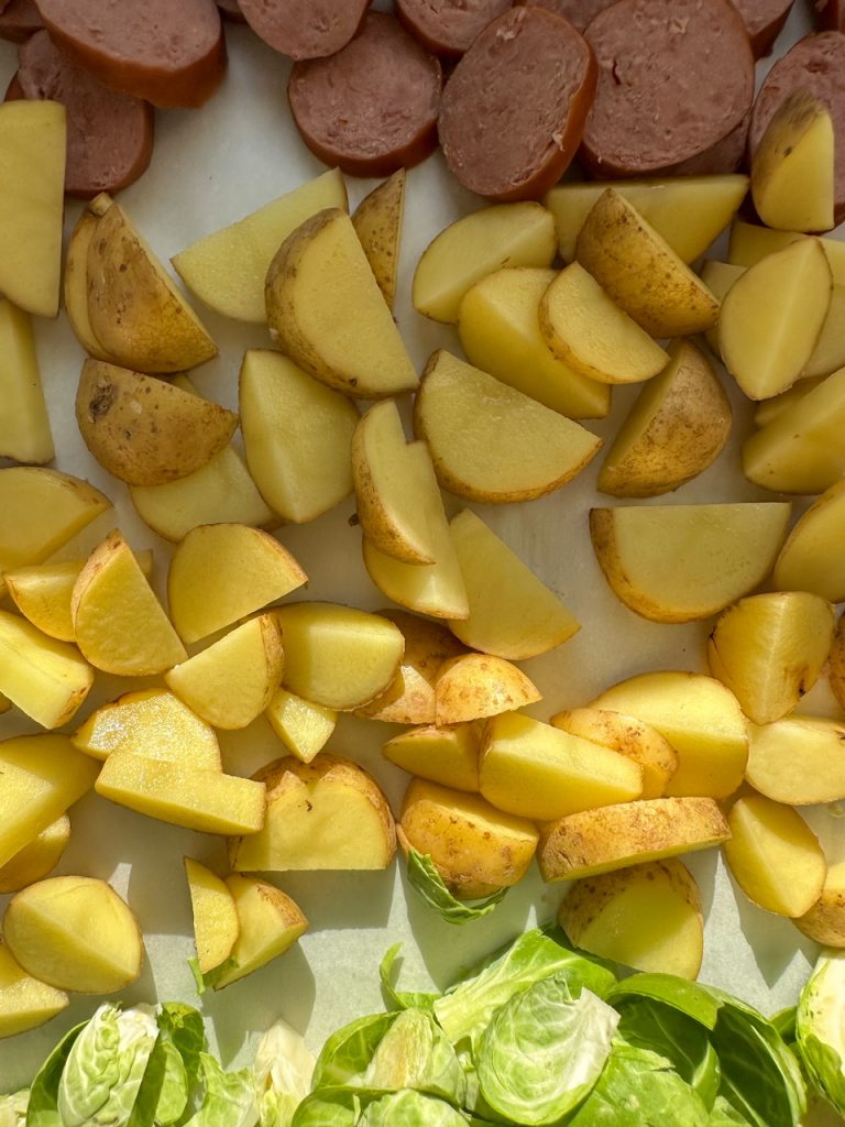 sliced potatoes on a sheet pan