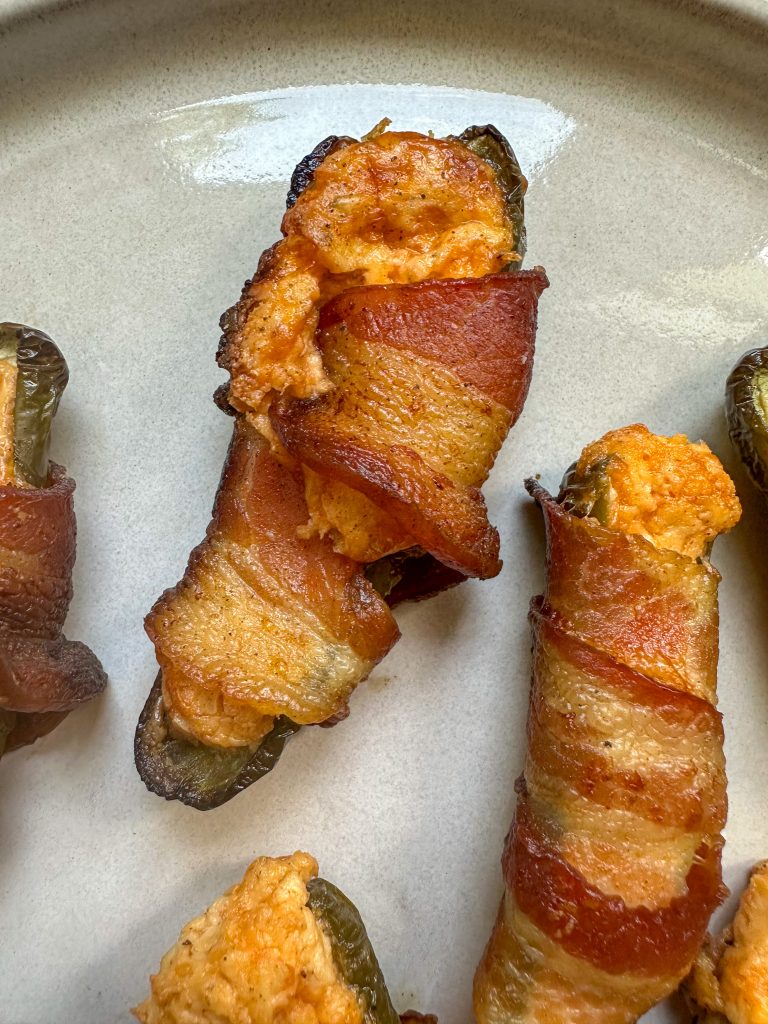 Jalapeno Poppers wrapped in bacon made on the smoker