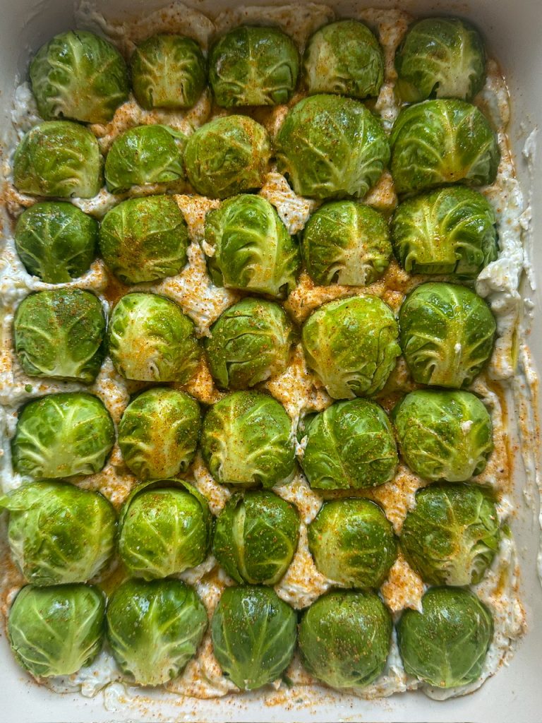 brussels sprouts getting ready to bake into blue cheese