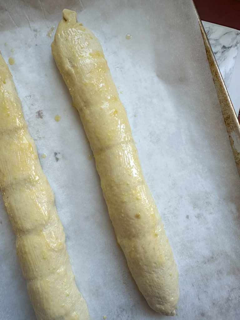 two strombolis about to go into the oven