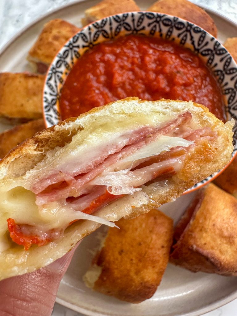 This deli stromboli is made with deli meat and cheese