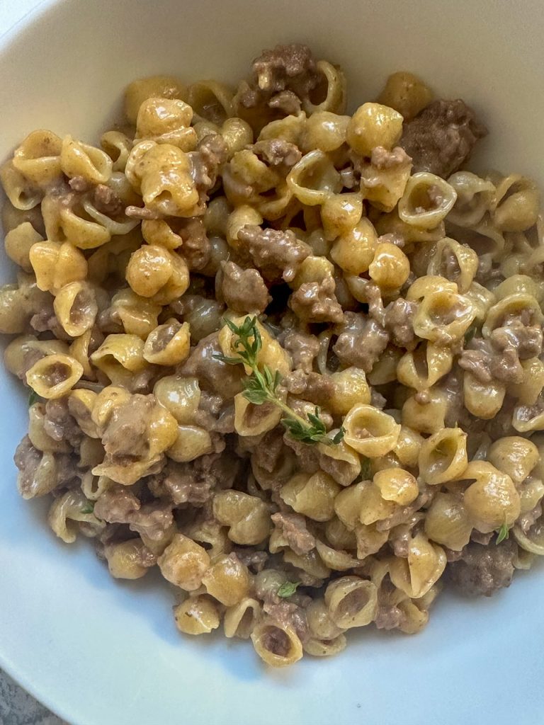 Boxed Mac and Cheese pasta boiled in bone broth to increase the protein