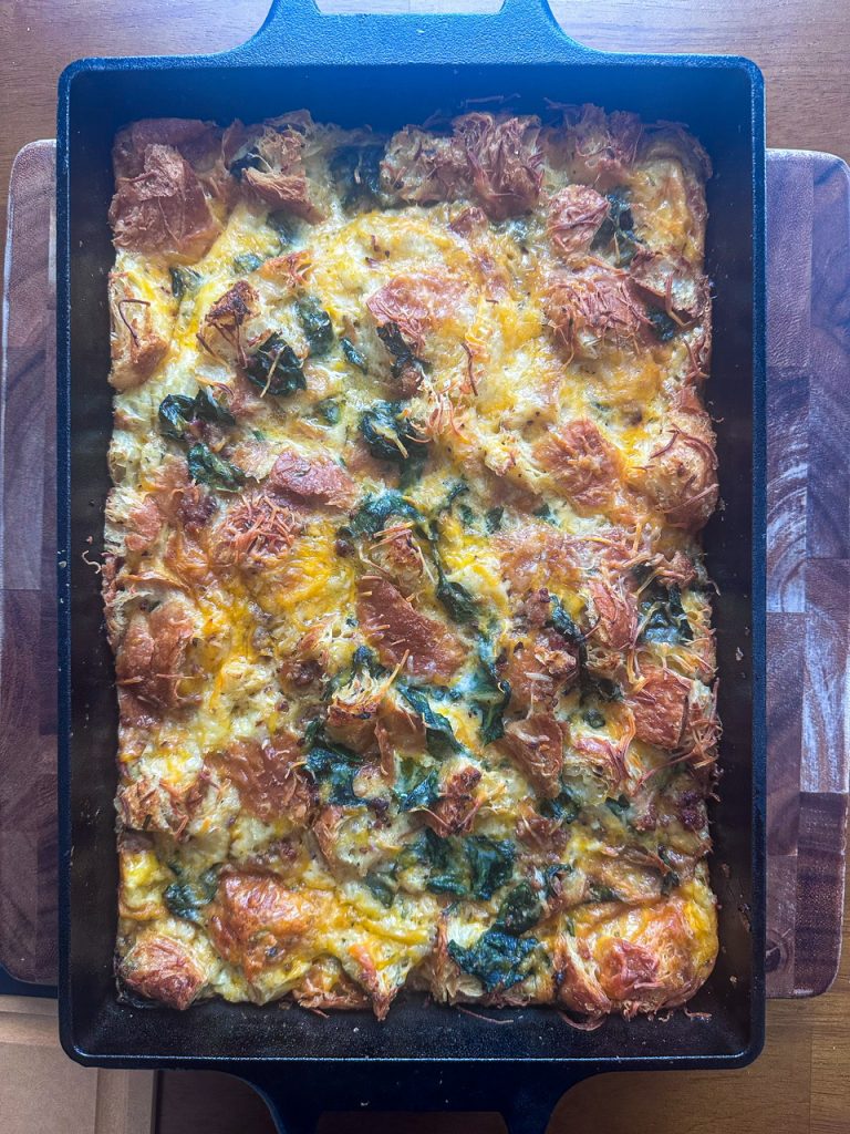 croissant breakfast bake with sausage, spinach, and cheese